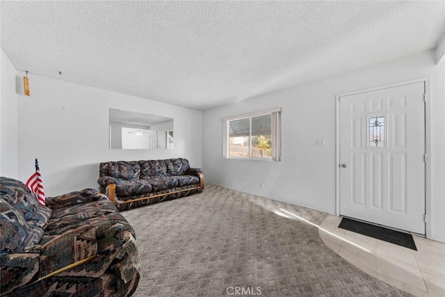 3648 Mira Pacific Dr, Oceanside, CA 92056 - living room featuring a textured ceiling and light carpet