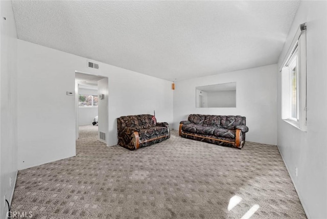 3648 Mira Pacific Dr, Oceanside, CA 92056 - living room with a textured ceiling and carpet