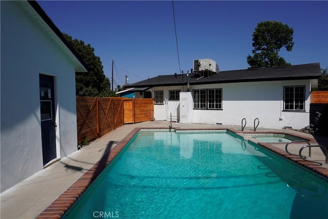 3565 Lashbrook Ave, Rosemead, CA 91770 - back of house featuring stucco siding and a pool with connected hot tub