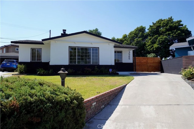 3565 Lashbrook Ave, Rosemead, CA 91770 - view of front of property with driveway, stucco siding, and brick siding