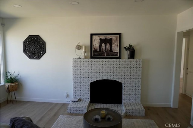 3565 Lashbrook Ave, Rosemead, CA 91770 - living room featuring wood finished floors, a fireplace, and recessed lighting