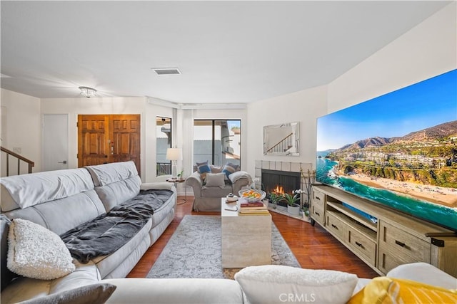 2608 W Grand Ave Unit B, Alhambra, CA 91801 - living area featuring a tile fireplace and wood finished floors