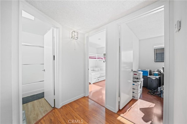 2608 W Grand Ave Unit B, Alhambra, CA 91801 - hall featuring a textured ceiling and wood finished floors