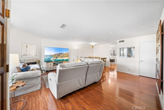 2608 W Grand Ave Unit B, Alhambra, CA 91801 - living area with wood finished floors and a tiled fireplace