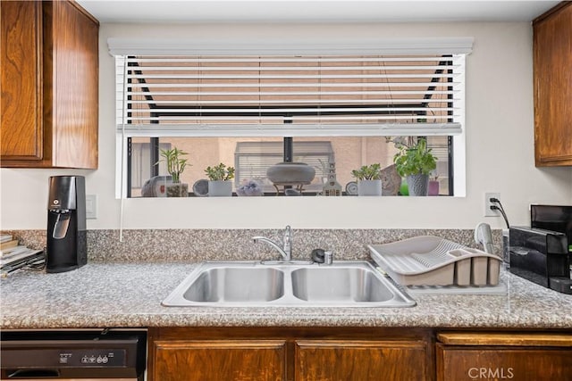 2608 W Grand Ave Unit B, Alhambra, CA 91801 - kitchen with dishwasher, brown cabinetry, and light countertops