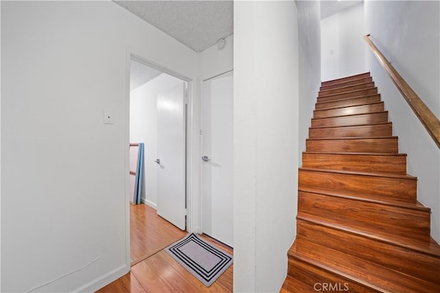 2608 W Grand Ave Unit B, Alhambra, CA 91801 - staircase with wood finished floors and baseboards