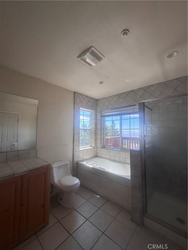 30134 Enchanted Way, Running Springs, CA 92382 - full bath with tile patterned flooring, a bath, vanity, a stall shower, and recessed lighting