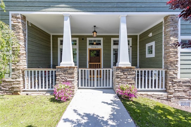 9401 Whispering Pines Rd, Frazier Park, CA 93225 - view of exterior entry with stone siding and a porch