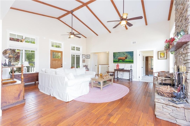 9401 Whispering Pines Rd, Frazier Park, CA 93225 - living room featuring a ceiling fan, high vaulted ceiling, hardwood / wood-style flooring, and beam ceiling