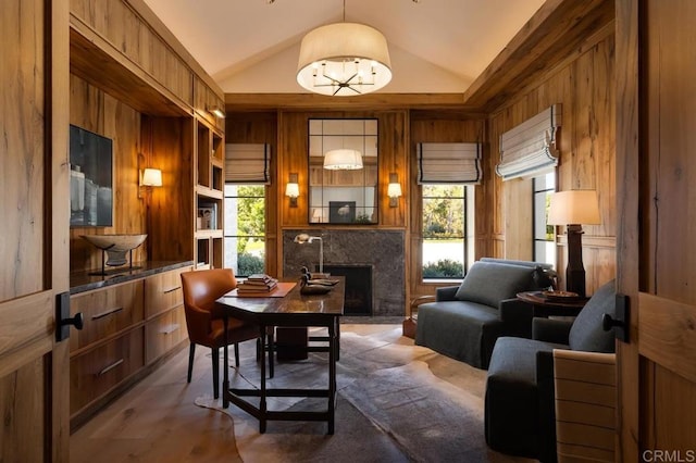 17845 Via De Fortuna, Rancho Santa Fe, CA 92067 - living area featuring vaulted ceiling, a fireplace, and wooden walls