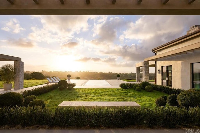 17845 Via De Fortuna, Rancho Santa Fe, CA 92067 - yard at dusk with a lawn, a pergola, and a patio