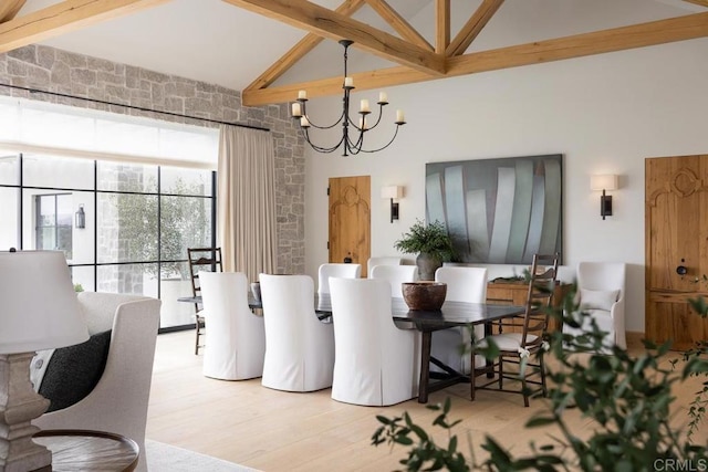 17845 Via De Fortuna, Rancho Santa Fe, CA 92067 - dining area with high vaulted ceiling, beamed ceiling, a chandelier, and light wood finished floors
