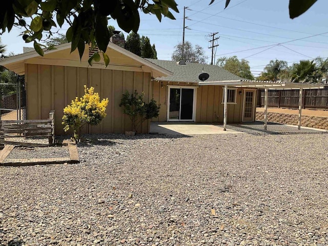 1110 E Alvarado St, Fallbrook, CA 92028 - rear view of property featuring board and batten siding, a patio, and a shingled roof