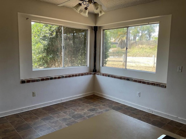 1110 E Alvarado St, Fallbrook, CA 92028 - spare room featuring a textured ceiling and a ceiling fan