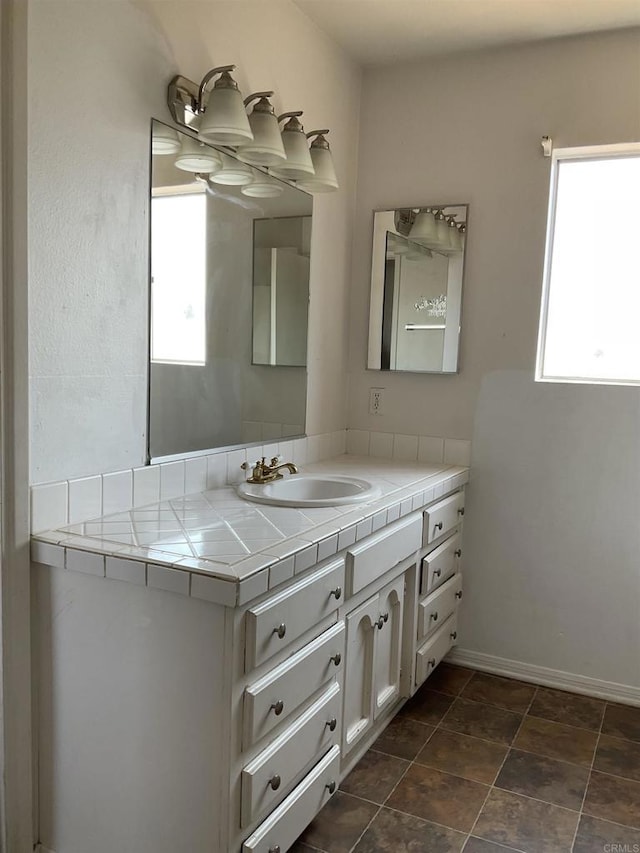 1110 E Alvarado St, Fallbrook, CA 92028 - bathroom featuring vanity and a chandelier