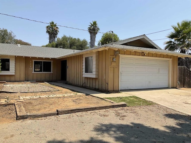 1110 E Alvarado St, Fallbrook, CA 92028 - single story home with board and batten siding, driveway, and roof with shingles