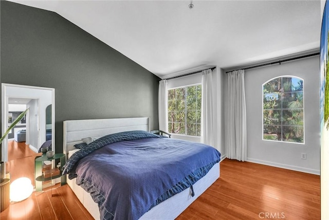 118 Gallery Way, Tustin, CA 92782 - bedroom with wood finished floors and vaulted ceiling