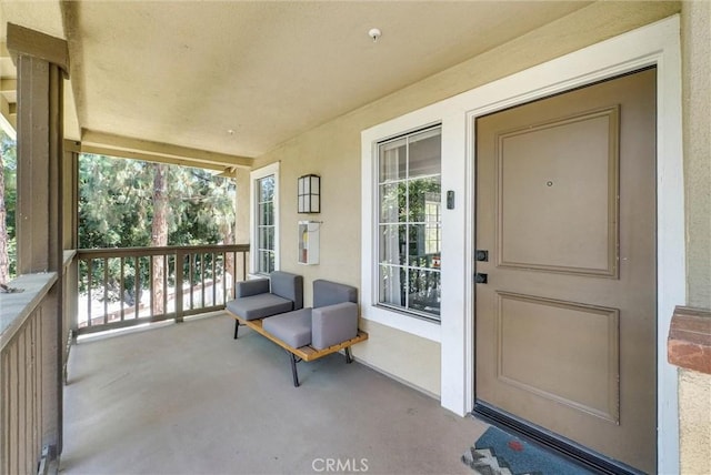 118 Gallery Way, Tustin, CA 92782 - doorway to property featuring stucco siding and covered porch