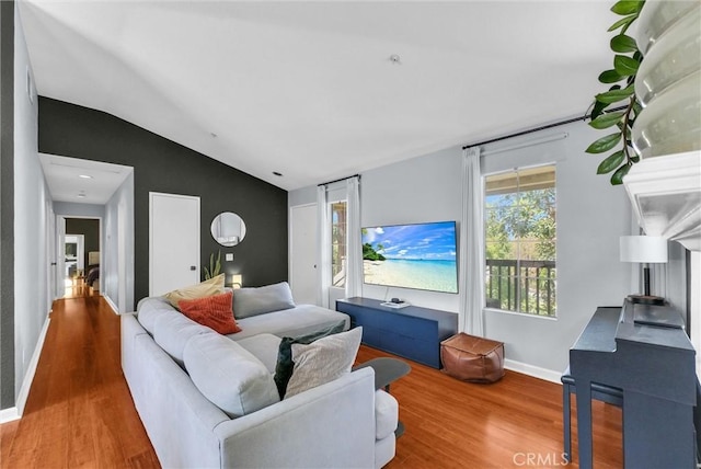 118 Gallery Way, Tustin, CA 92782 - living area with vaulted ceiling and wood finished floors