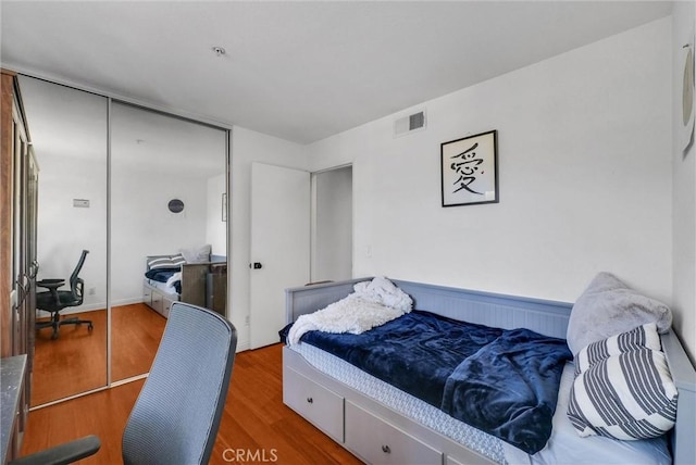 118 Gallery Way, Tustin, CA 92782 - bedroom with wood finished floors and a closet