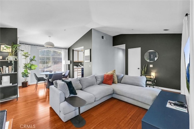 118 Gallery Way, Tustin, CA 92782 - living area with lofted ceiling and wood finished floors