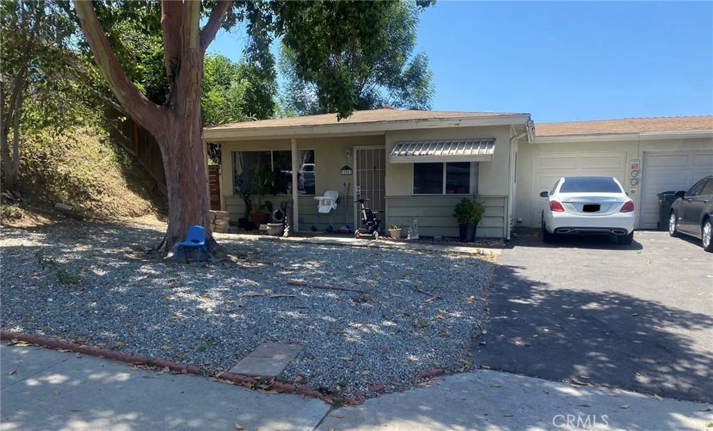 205 Hollenbeck Rd, San Marcos, CA 92069 - view of front facade featuring driveway and an attached garage
