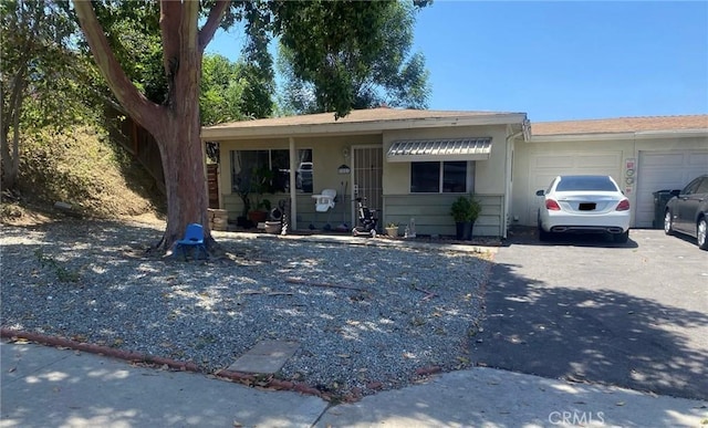 205 Hollenbeck Rd, San Marcos, CA 92069 - view of front facade featuring driveway and an attached garage