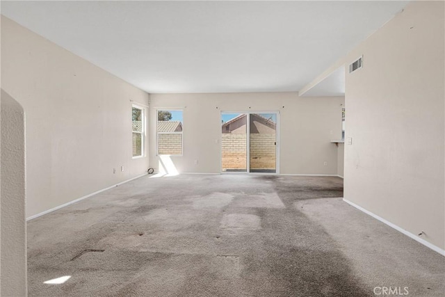14094 Gray Ln, Victorville, CA 92394 - unfurnished living room with carpet flooring and baseboards