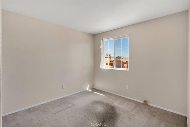 14094 Gray Ln, Victorville, CA 92394 - carpeted spare room with baseboards