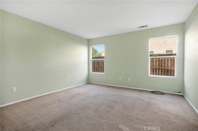 14094 Gray Ln, Victorville, CA 92394 - spare room featuring carpet floors and baseboards