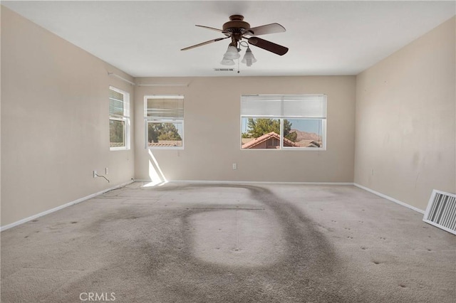14094 Gray Ln, Victorville, CA 92394 - carpeted empty room with a ceiling fan and baseboards