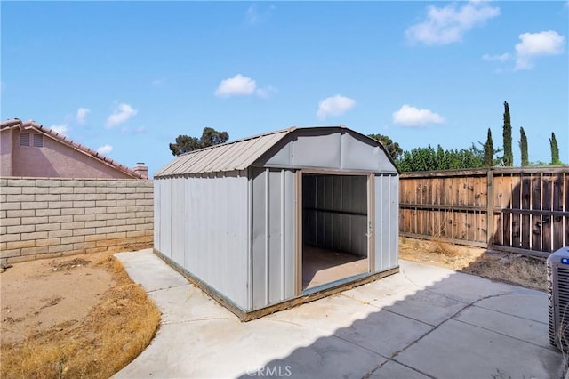 14094 Gray Ln, Victorville, CA 92394 - view of shed featuring a fenced backyard