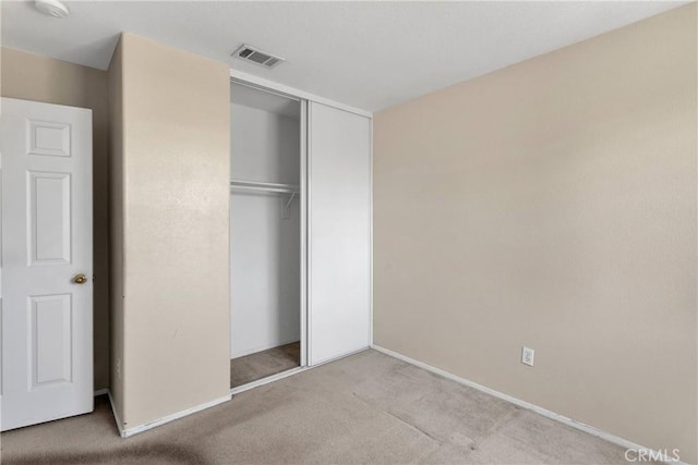 14094 Gray Ln, Victorville, CA 92394 - unfurnished bedroom featuring carpet floors and a closet
