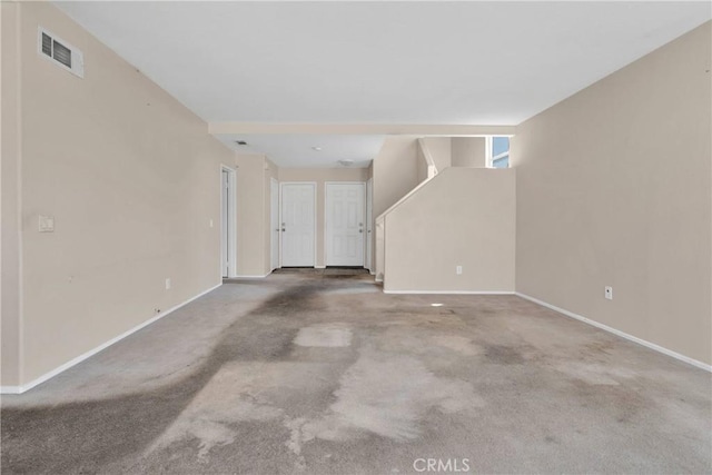 14094 Gray Ln, Victorville, CA 92394 - unfurnished living room featuring baseboards and carpet floors