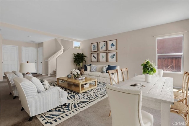 14094 Gray Ln, Victorville, CA 92394 - living area with healthy amount of natural light, stairway, and carpet flooring