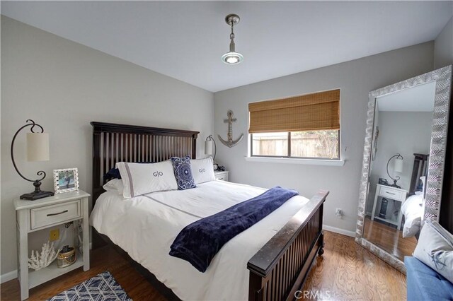 375 N 6th St, Grover Beach, CA 93433 - bedroom with wood finished floors and baseboards