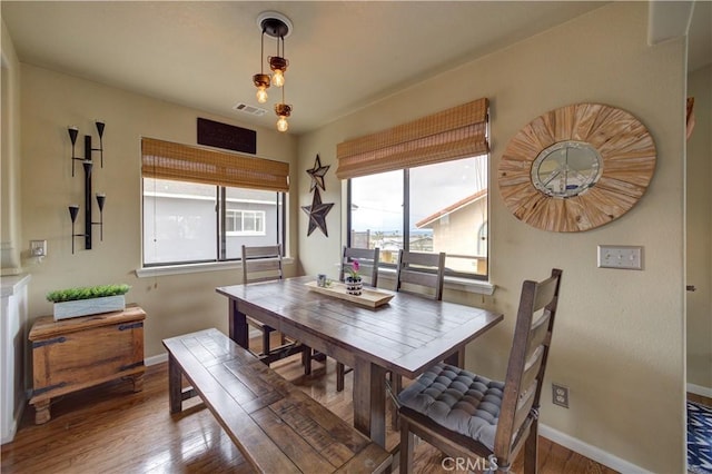 375 N 6th St, Grover Beach, CA 93433 - dining space featuring wood finished floors and baseboards