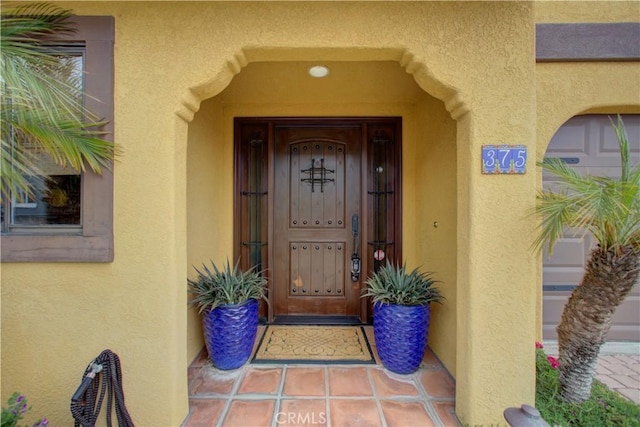 375 N 6th St, Grover Beach, CA 93433 - doorway to property with stucco siding