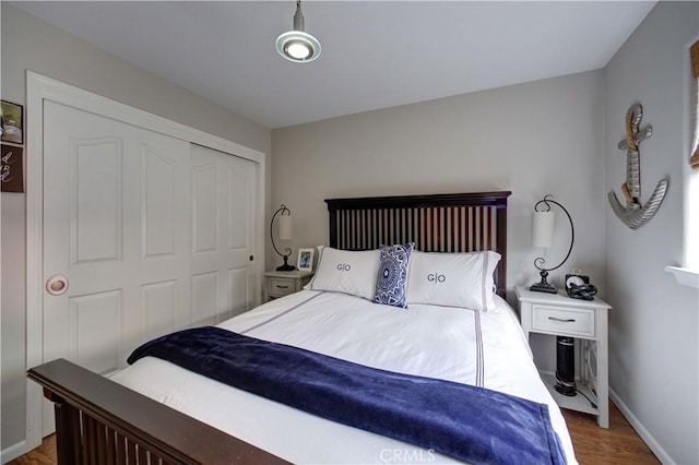 375 N 6th St, Grover Beach, CA 93433 - bedroom with wood finished floors and a closet