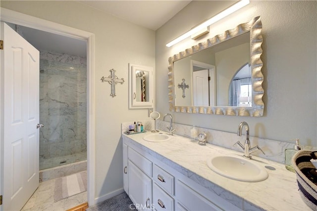 375 N 6th St, Grover Beach, CA 93433 - bathroom featuring double vanity and a marble finish shower