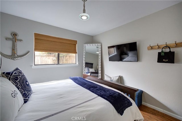 375 N 6th St, Grover Beach, CA 93433 - bedroom featuring baseboards and wood finished floors