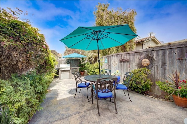 375 N 6th St, Grover Beach, CA 93433 - fenced backyard featuring a patio area, outdoor dining space, and a grill