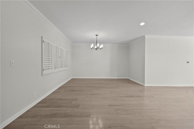 12355 Chandler Blvd Unit 101, Valley Village, CA 91607 - spare room featuring a chandelier, light wood-style flooring, crown molding, and recessed lighting