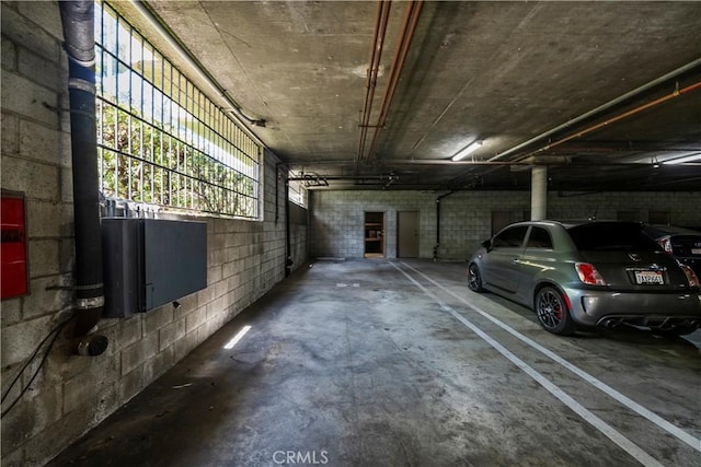 12355 Chandler Blvd Unit 101, Valley Village, CA 91607 - parking deck featuring concrete block wall