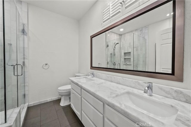 12355 Chandler Blvd Unit 101, Valley Village, CA 91607 - full bath with a shower stall, double vanity, and tile patterned flooring