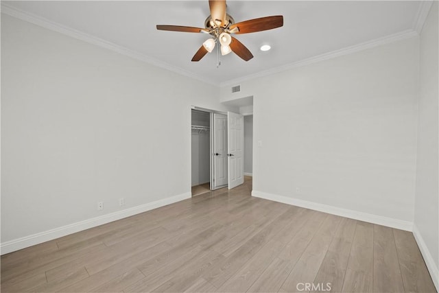 12355 Chandler Blvd Unit 101, Valley Village, CA 91607 - unfurnished bedroom with ornamental molding, wood finished floors, a closet, and ceiling fan