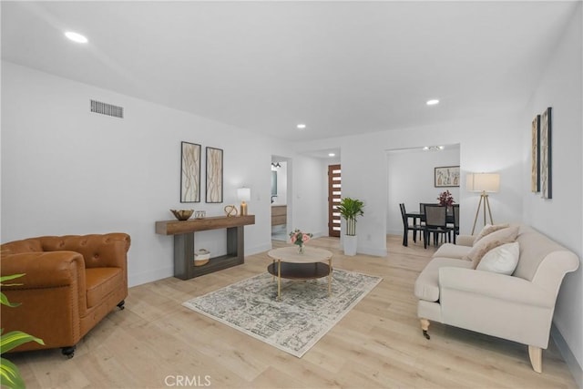 6611 Pickett Ave, Garden Grove, CA 92845 - living area featuring light wood-type flooring and recessed lighting
