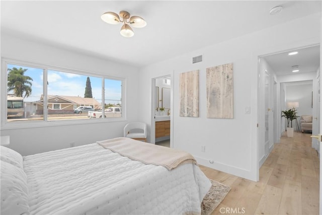 6611 Pickett Ave, Garden Grove, CA 92845 - bedroom with light wood-style flooring and recessed lighting