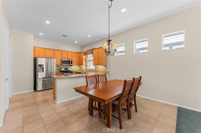 1790 N Forest Oaks Dr, Beaumont, CA 92223 - dining area featuring a chandelier, light tile patterned flooring, and recessed lighting
