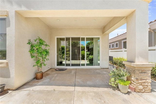 1790 N Forest Oaks Dr, Beaumont, CA 92223 - doorway to property with stucco siding and a patio